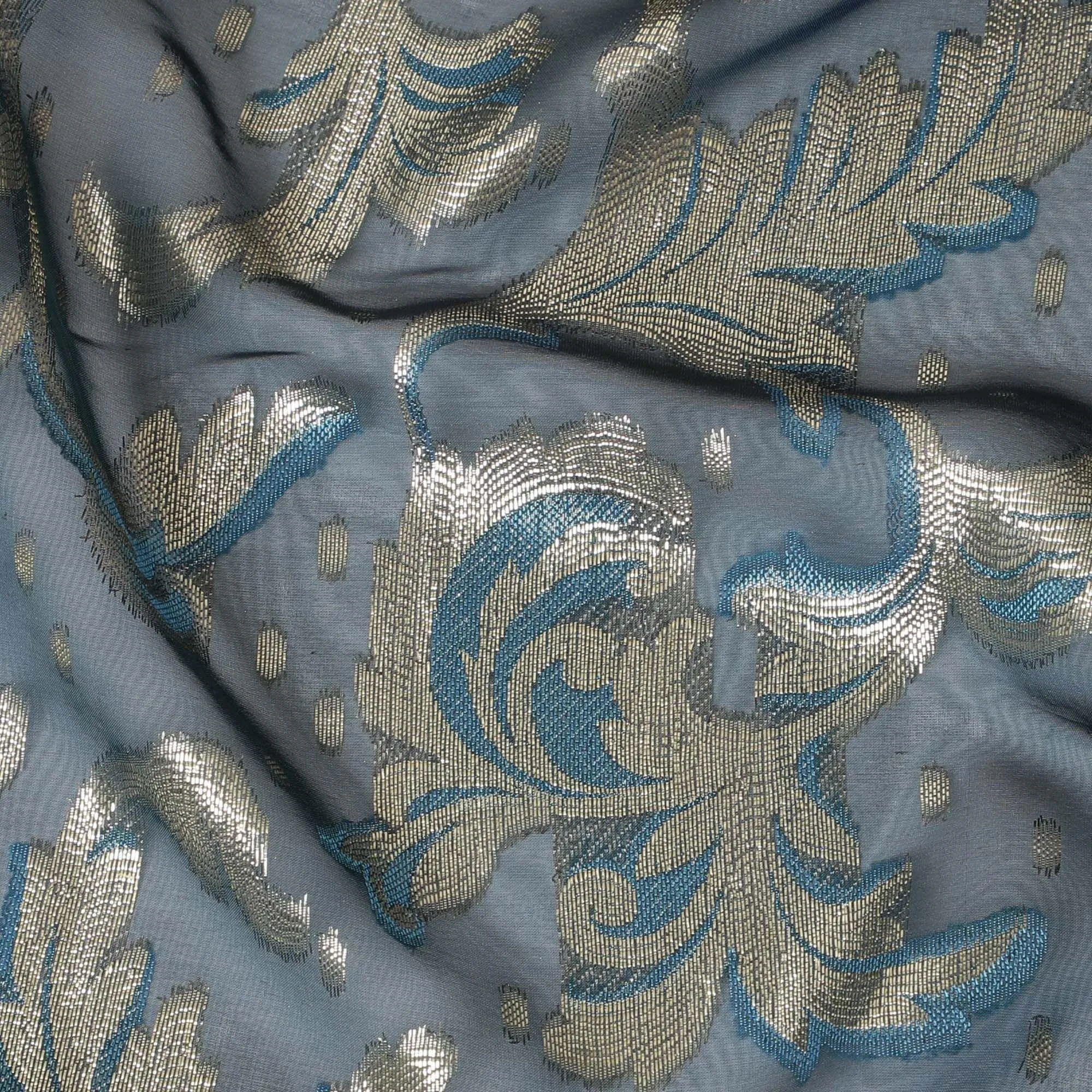 Petrol blue premium pure French (Fransawi) silk chiffon fabric with blue viscose and gold metallic lurex in floral design-D10586